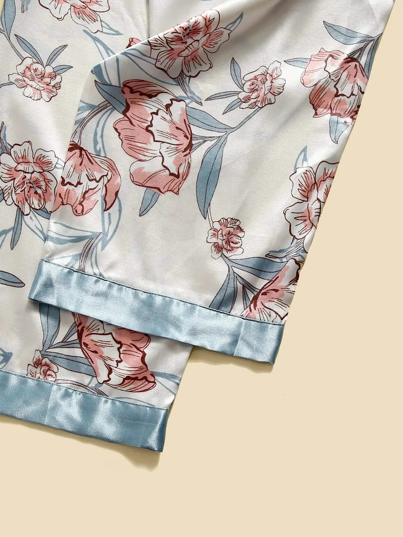 "Get cozy in this 5-piece floral print satin set! 🌸✨ #SatinRobe #CamiTop #NightDress #Pants #Shorts"