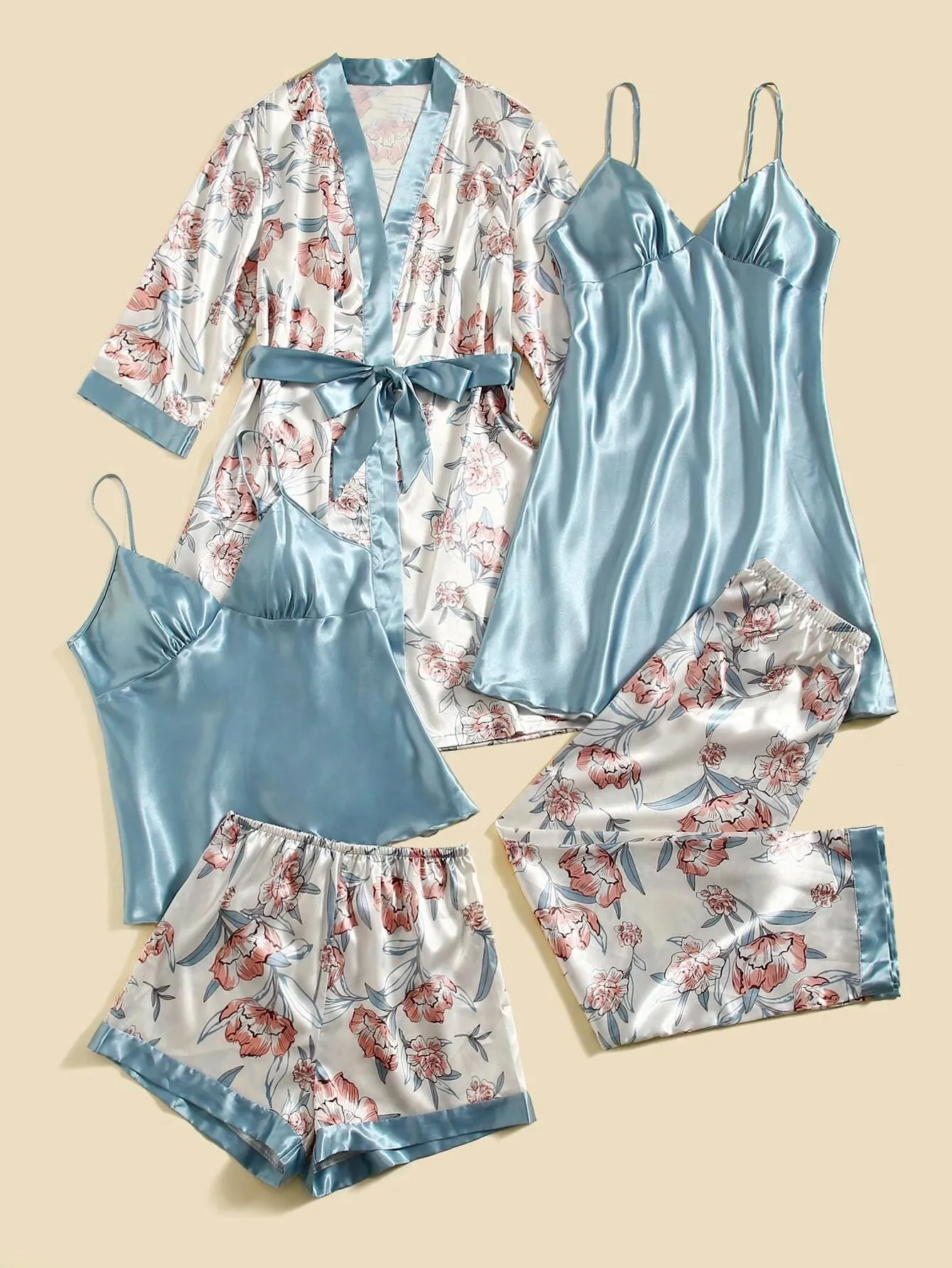 "Get cozy in this 5-piece floral print satin set! 🌸✨ #SatinRobe #CamiTop #NightDress #Pants #Shorts"