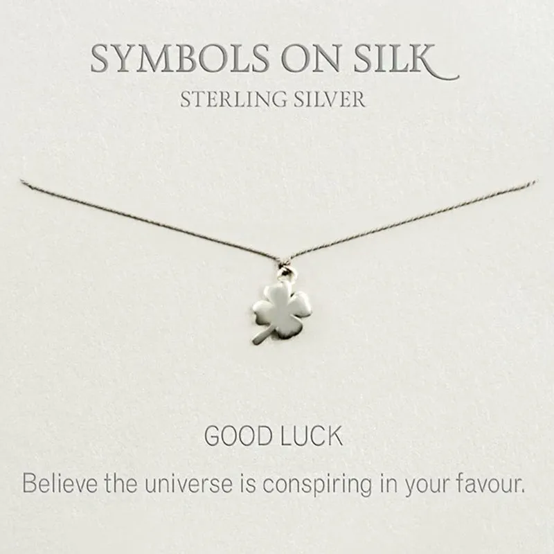 Sterling Silver Four Leaf Clover necklace on silk